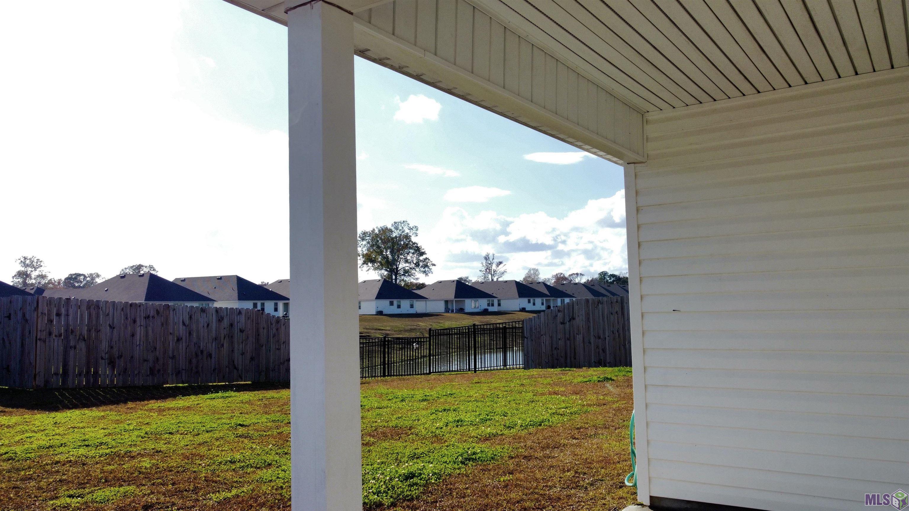 13536 Marsala Court Baton Rouge, LA 70817 - Photo 12 of 17 Back patio with water view