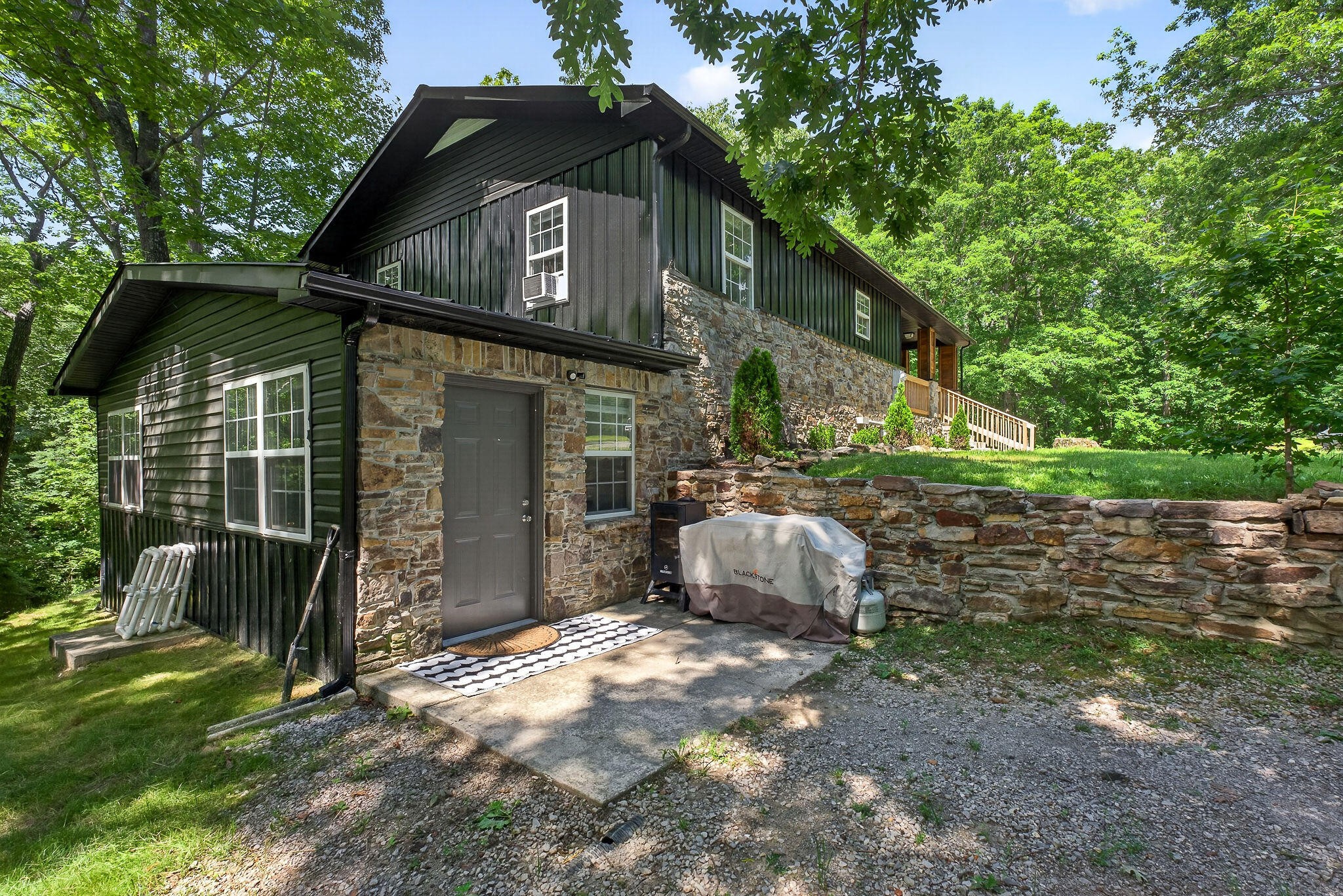 9388 Harrison Ferry Road McMinnville, TN 37110 - Photo 33 of 41 a view of a house with a yard