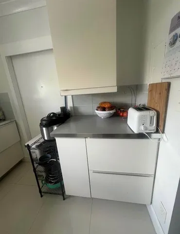 a swimming pool with outdoor seating and yard