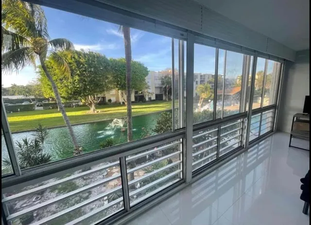 a view of a large window with an outdoor space