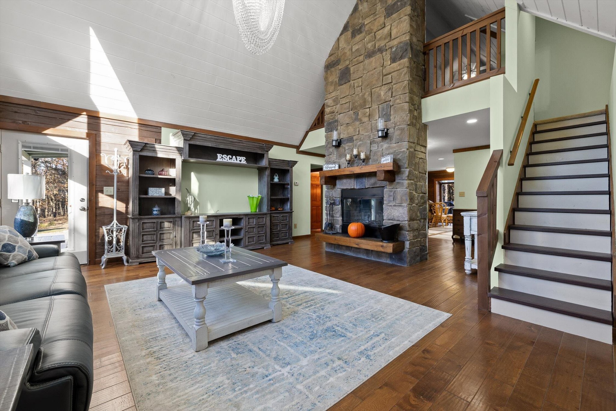 504 Wolf Run Rising Fawn, GA 30738 - Photo 12 of 100 a living room with fireplace furniture and a wooden floor