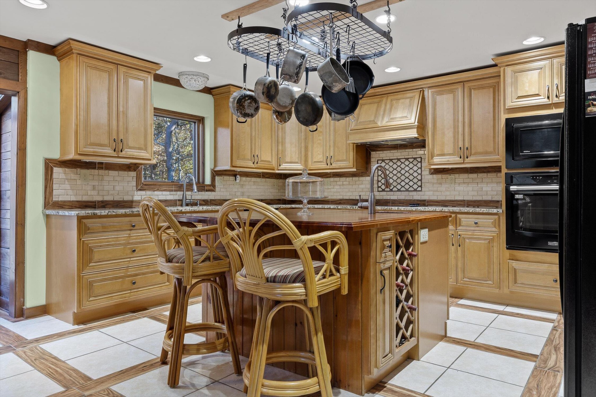 504 Wolf Run Rising Fawn, GA 30738 - Photo 25 of 100 a kitchen with stainless steel appliances granite countertop a sink and cabinets
