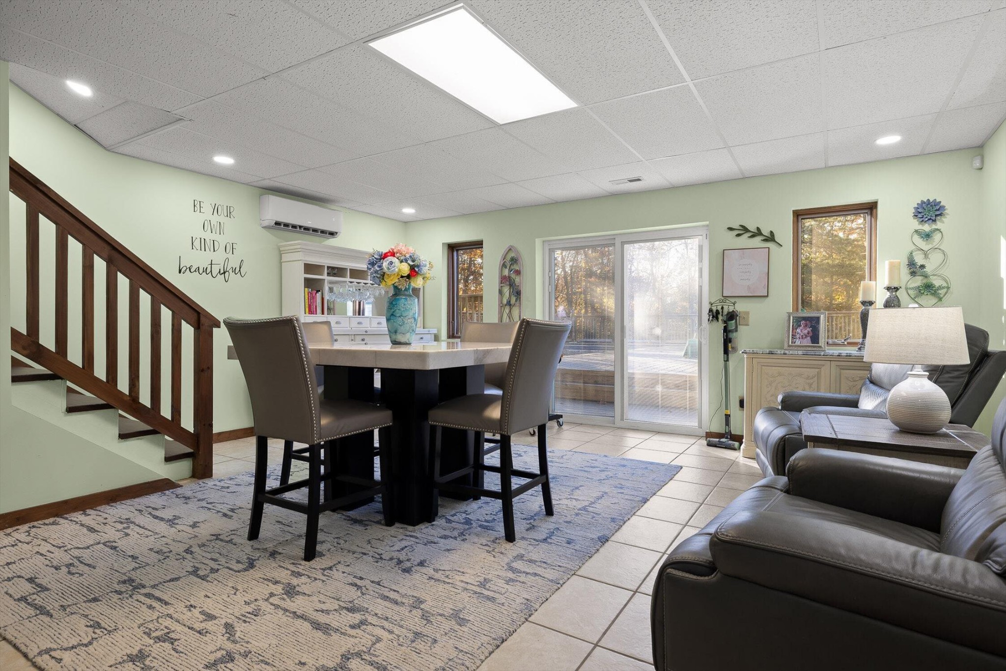 504 Wolf Run Rising Fawn, GA 30738 - Photo 48 of 100 a living room with furniture and a dining table with wooden floor