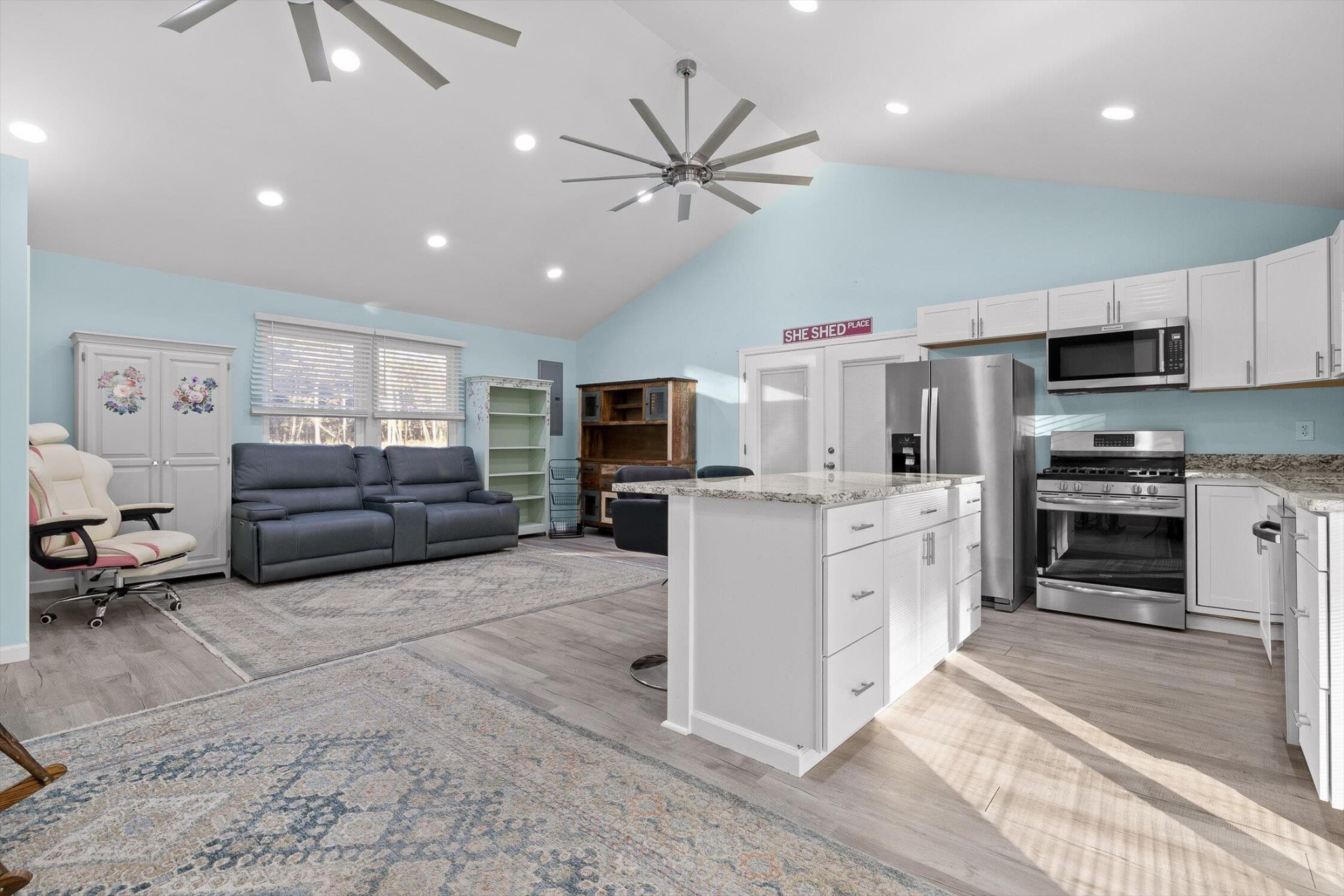 504 Wolf Run Rising Fawn, GA 30738 - Photo 75 of 100 a living room with furniture a flat screen tv and kitchen view