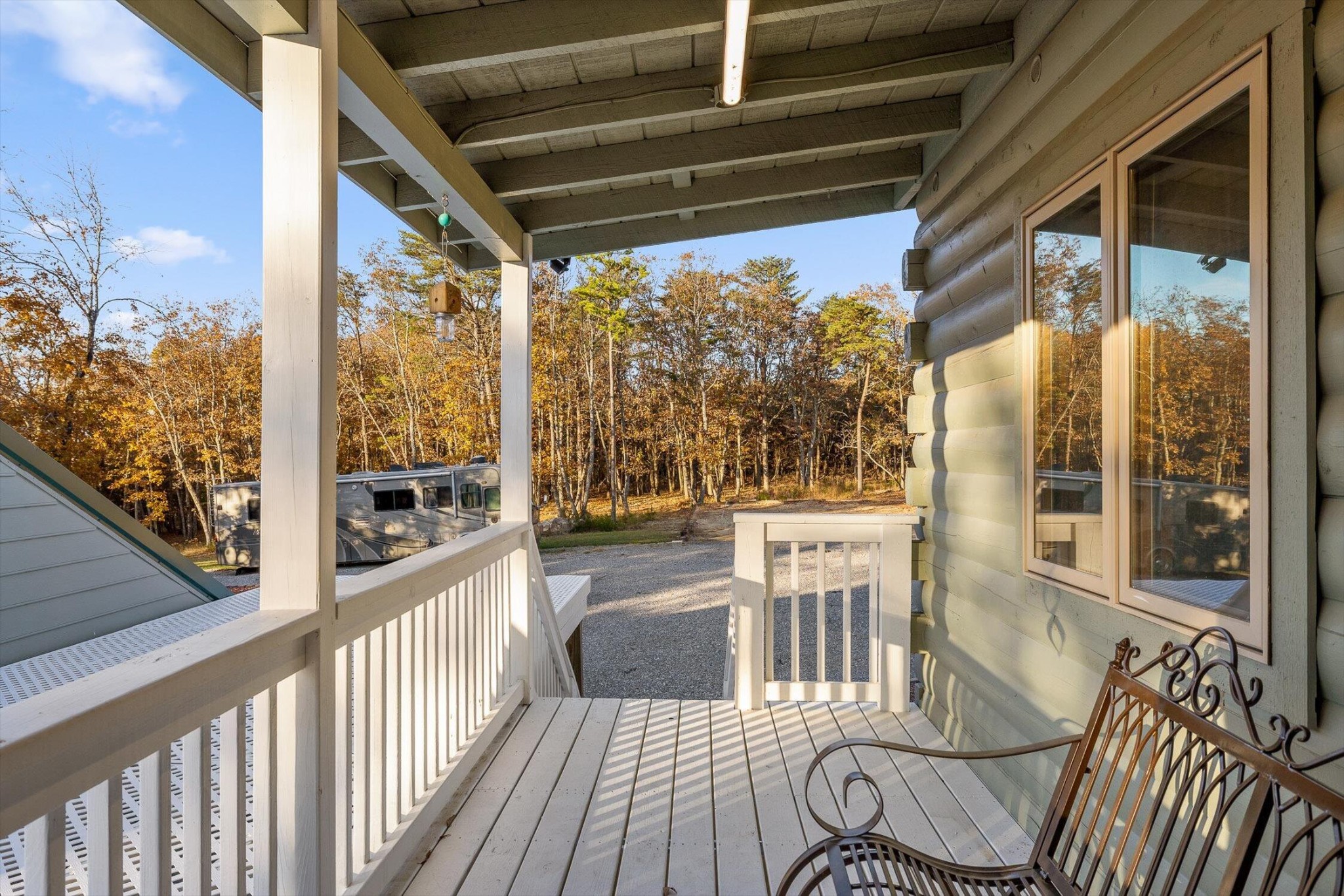 504 Wolf Run Rising Fawn, GA 30738 - Photo 99 of 100 a view of a porch with wooden floor and furniture