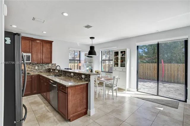 $975,000 | 8895 Northwest 100th Place, Doral, FL 33178