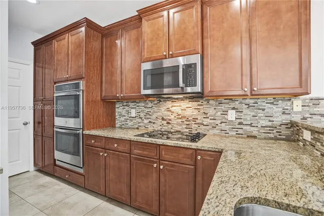 $975,000 | 8895 Northwest 100th Place, Doral, FL 33178