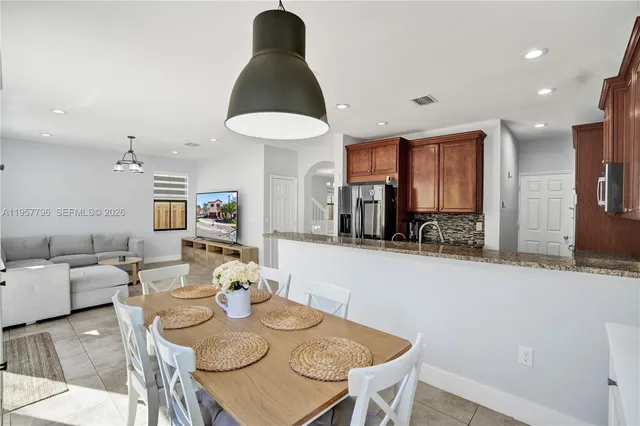 $975,000 | 8895 Northwest 100th Place, Doral, FL 33178