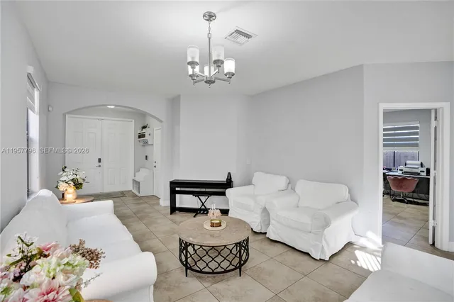 $975,000 | 8895 Northwest 100th Place, Doral, FL 33178