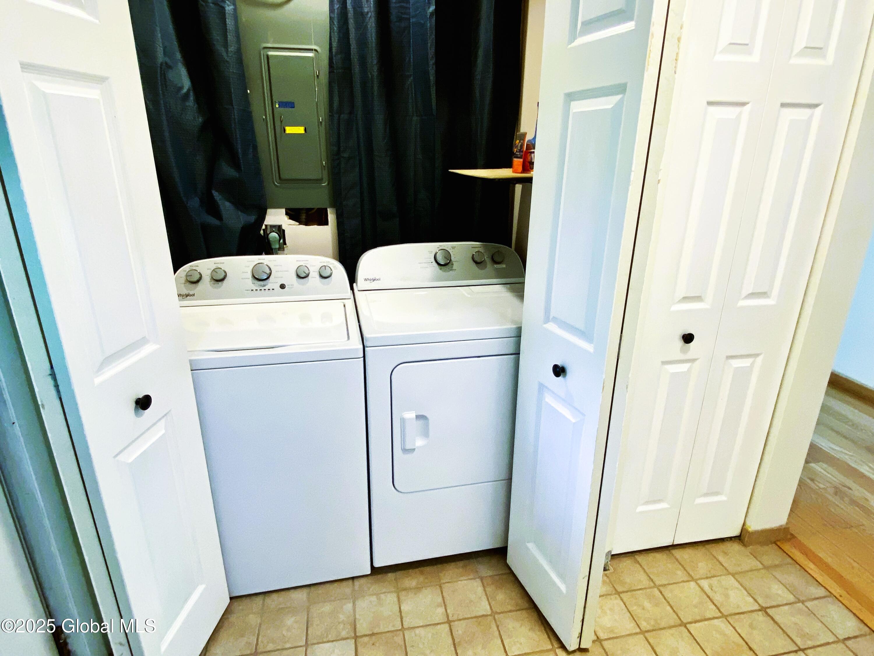 26 Queensway Queensbury, NY 12804 - Photo 14 of 32 15-Laundry Closet-Electrical Panel