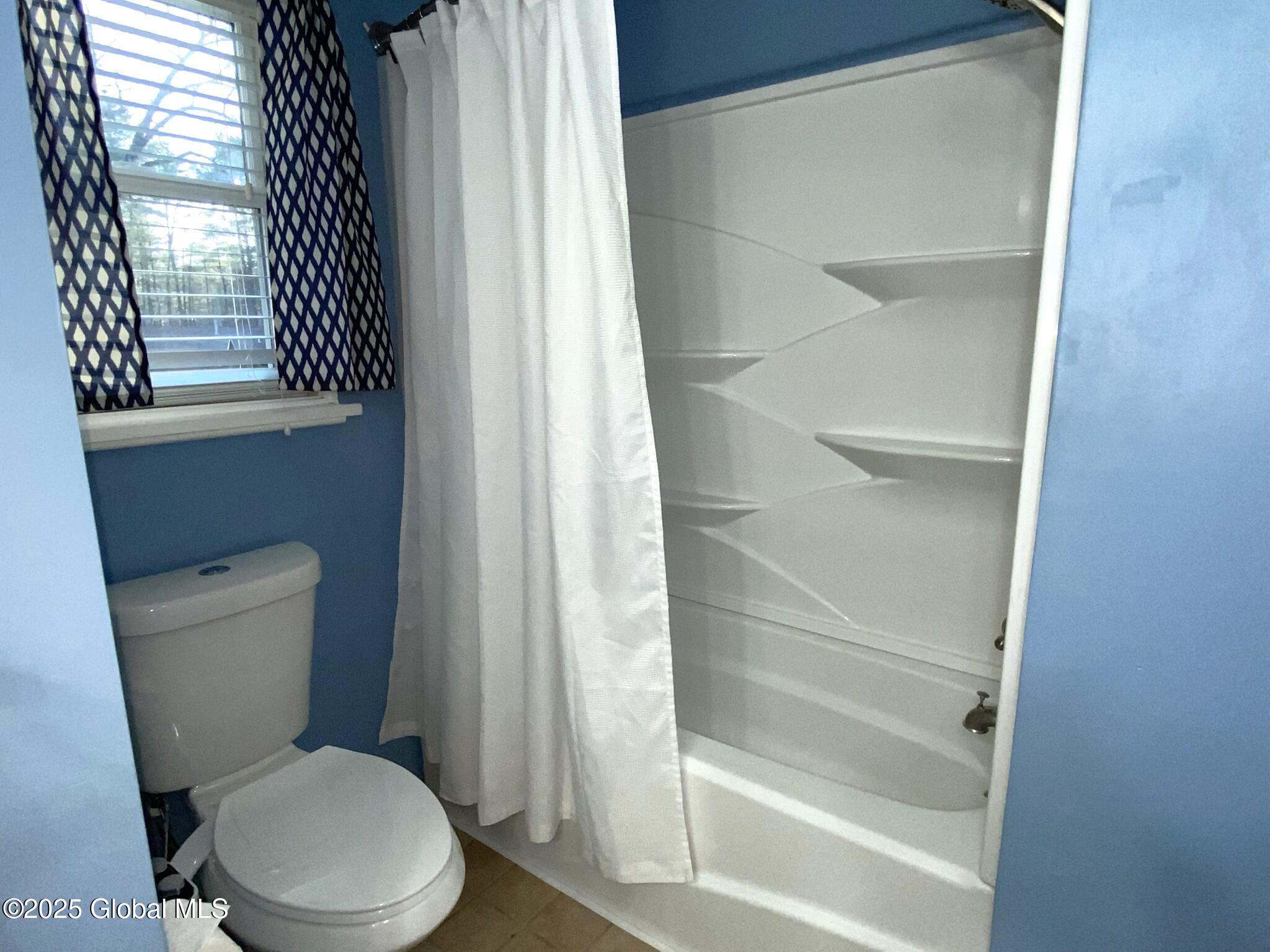 26 Queensway Queensbury, NY 12804 - Photo 23 of 32 24-Main Bath Tub_Shower w Shelves
