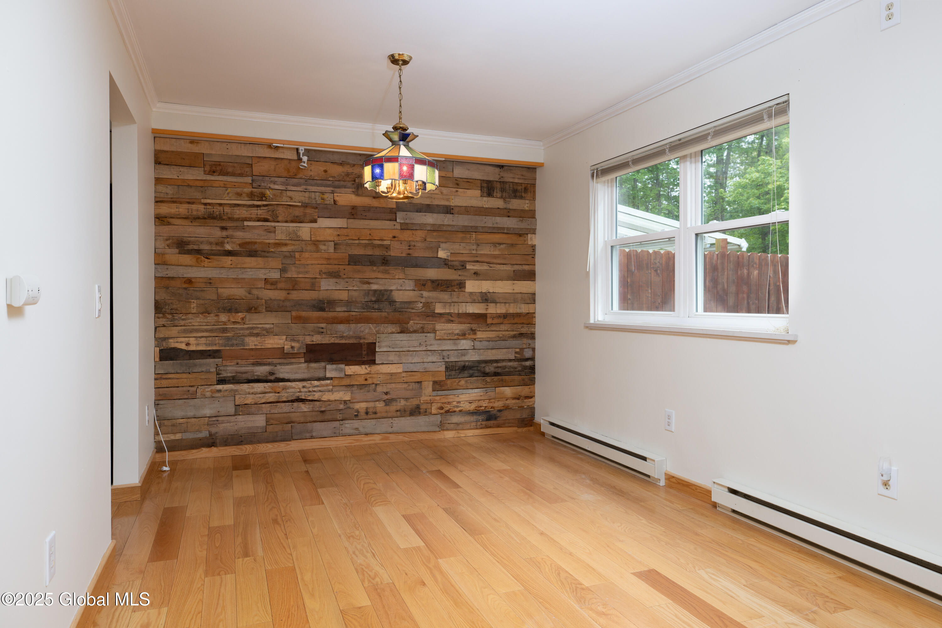 26 Queensway Queensbury, NY 12804 - Photo 9 of 32 10-Dining Area-Wood Feature Wall