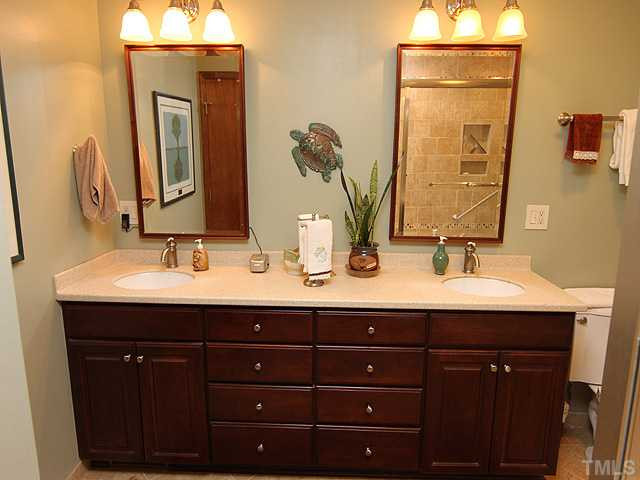 8829 Woodyhill Road Raleigh, NC 27613 - Photo 3 of 21 This master bath had a great renovation in 2007. Bath vanity has quiet self closing drawers. Master Bath/Spa