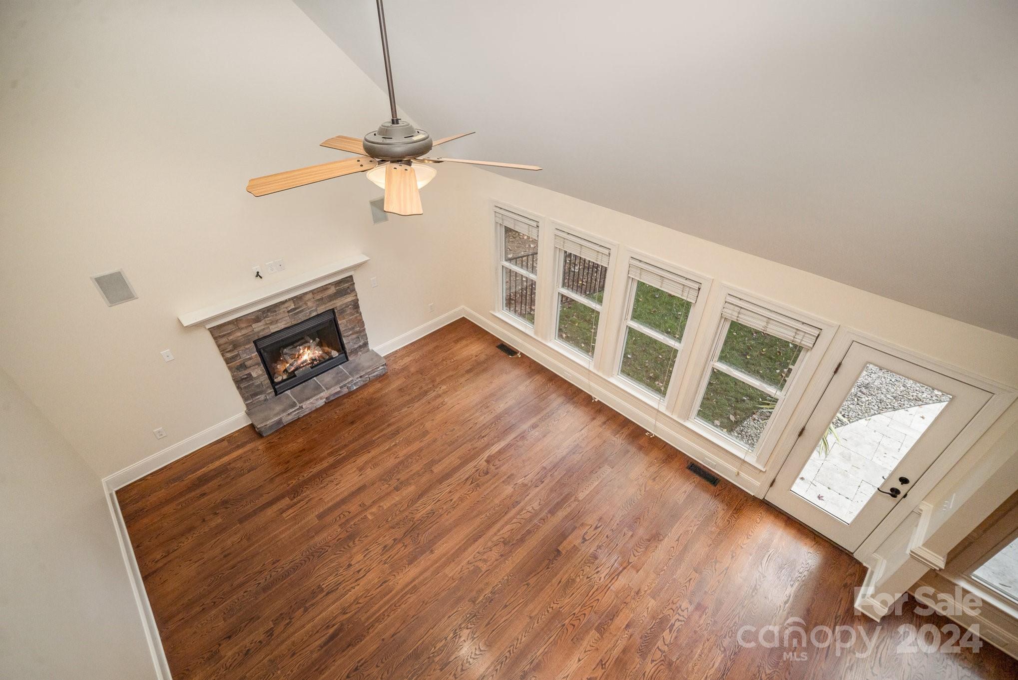 4125 Lake Shore Road South Denver, NC 28037 - Photo 8 of 38 a living room with furniture and a fireplace