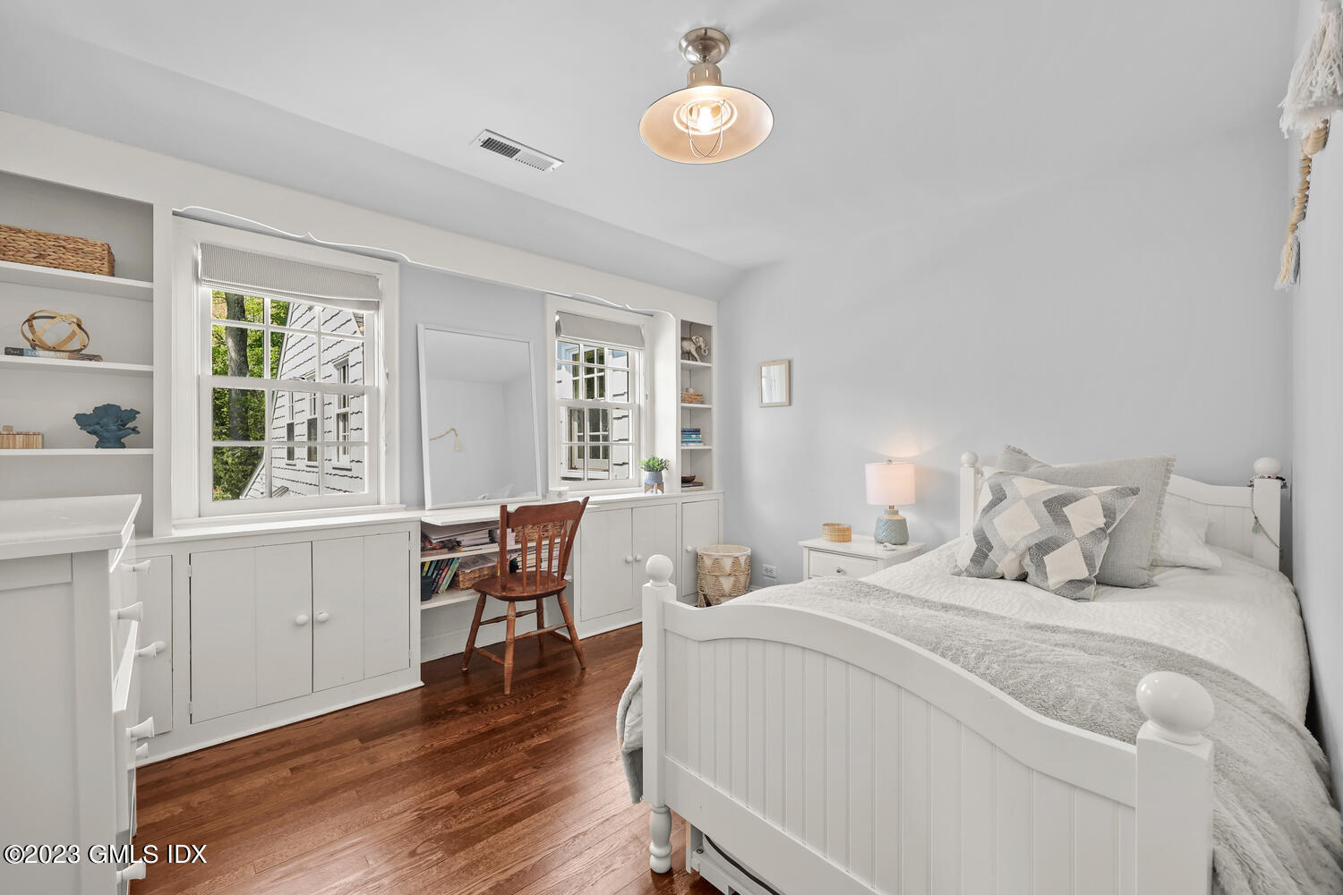 14 Crescent Road Riverside, CT 06878 - Photo 22 of 28 a bedroom with a large bed and a large window