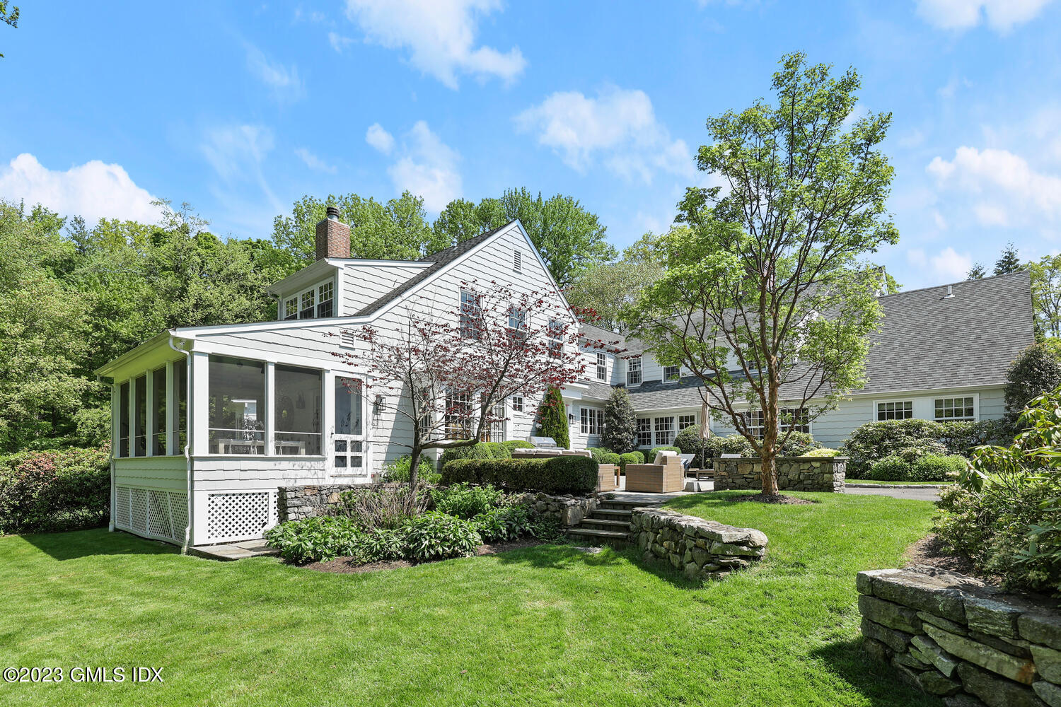 14 Crescent Road Riverside, CT 06878 - Photo 25 of 28 a front view of a house with a yard