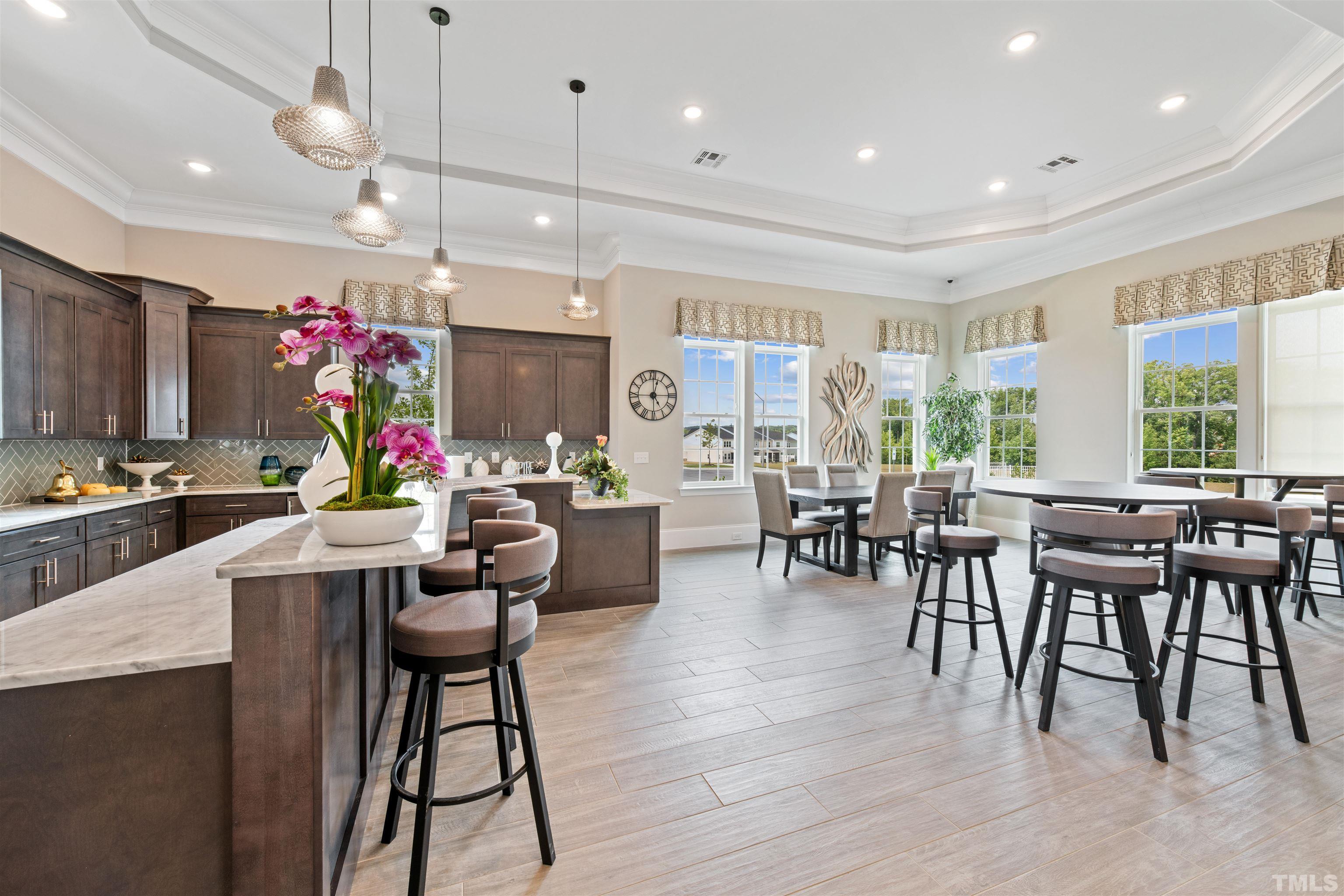 2009 Abbeyhill Drive Raleigh, NC 27610 - Photo 6 of 12 a view of a dining room with furniture window and wooden floor