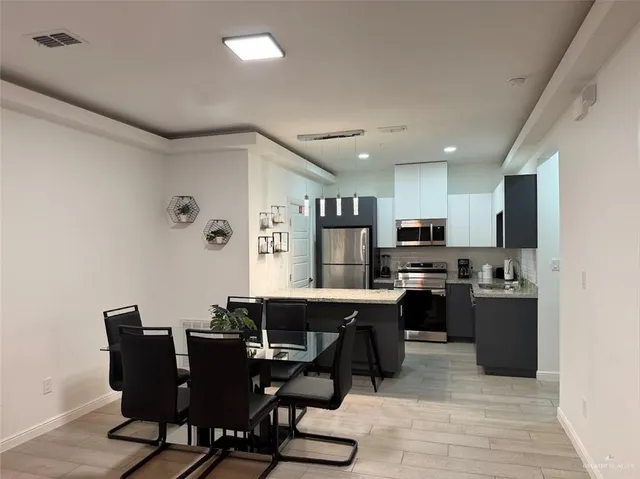 a view of a dining room with furniture