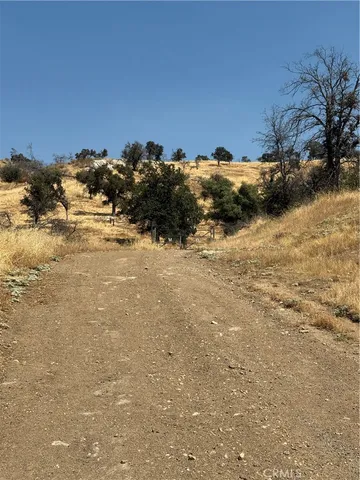 a view of snow on the side of the road
