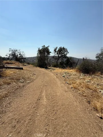 a view of ocean view with wooden fence