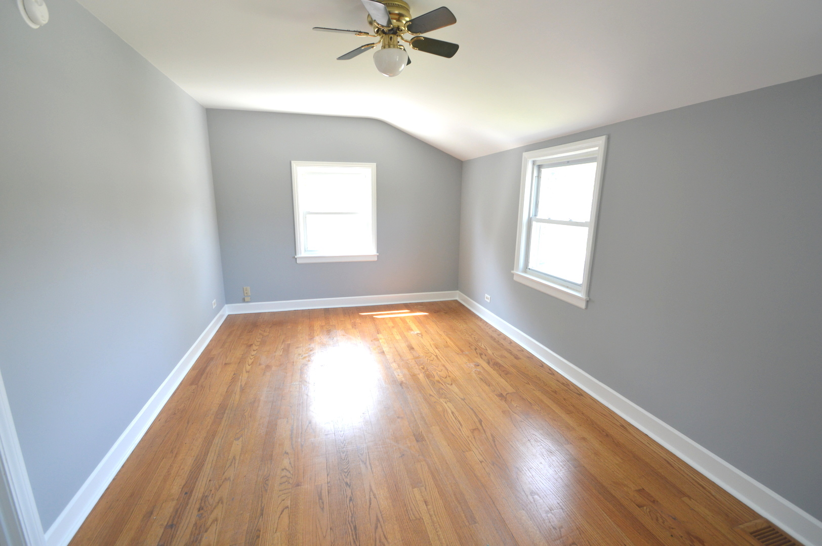 1517 Morris Avenue Berkeley, IL 60163 - Photo 12 of 35 wooden floor in an empty room with a window