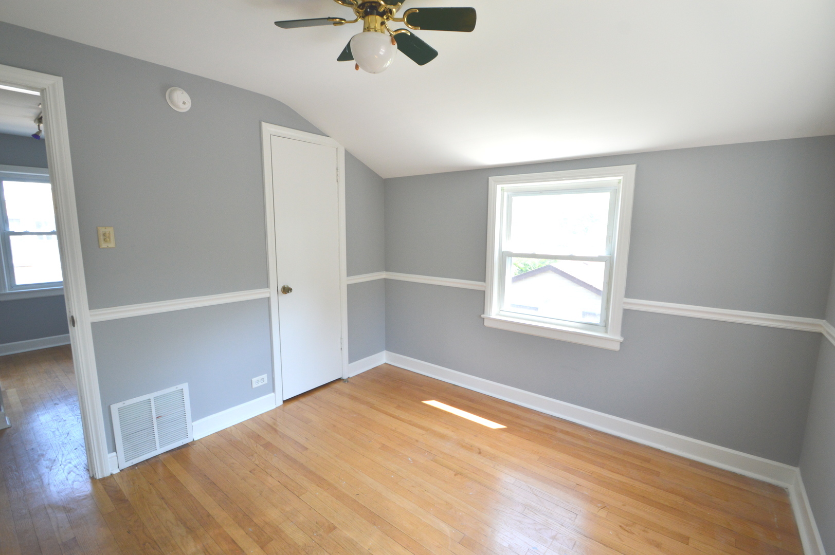 1517 Morris Avenue Berkeley, IL 60163 - Photo 14 of 35 wooden floor in an empty room with a window