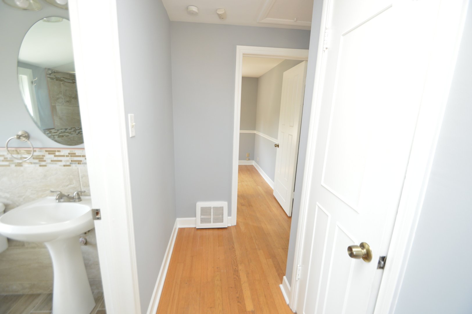 1517 Morris Avenue Berkeley, IL 60163 - Photo 15 of 35 a bathroom with a sink and a mirror