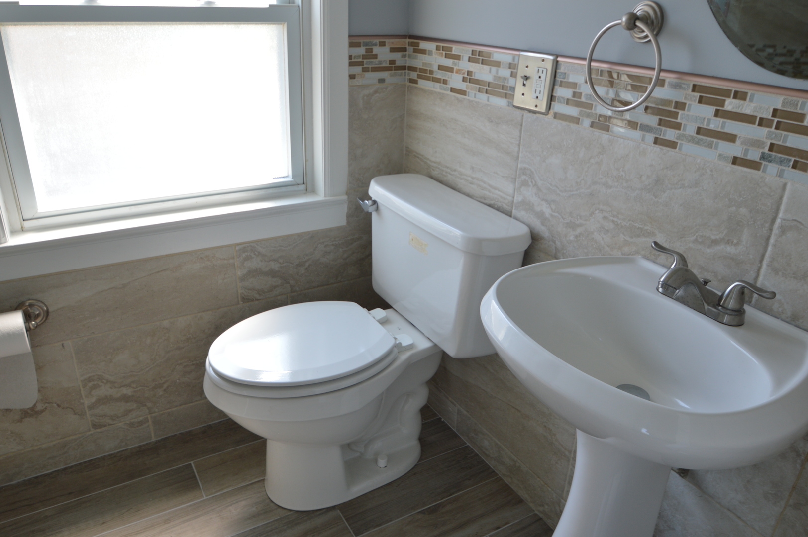 1517 Morris Avenue Berkeley, IL 60163 - Photo 17 of 35 a bathroom with a sink and a toilet
