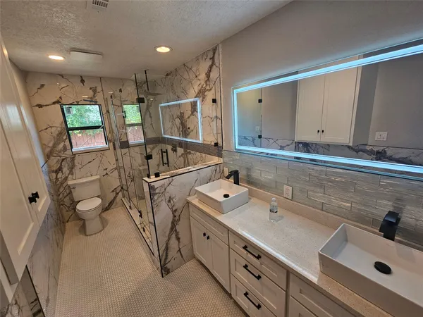 a view of balcony with furniture