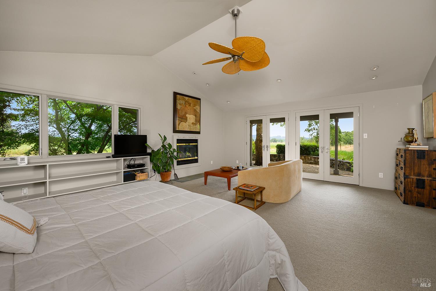 6003-6017 Red Winery Road Geyserville, CA 95441 - Photo 32 of 97 a bedroom with furniture and a large window