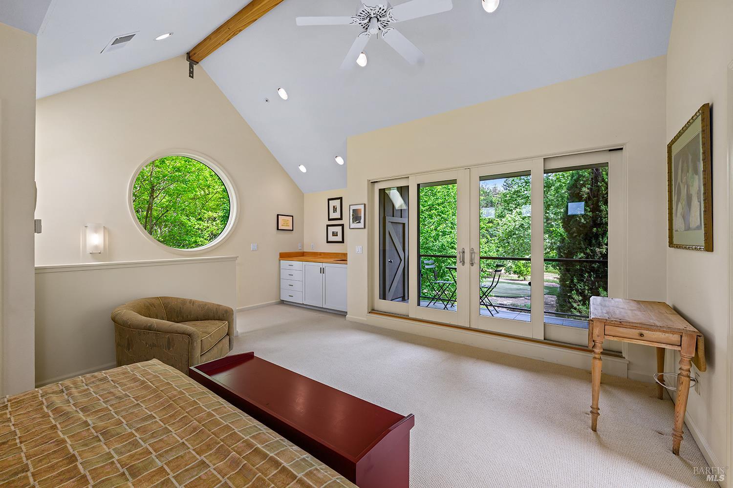 6003-6017 Red Winery Road Geyserville, CA 95441 - Photo 70 of 97 a bedroom with furniture and a large window