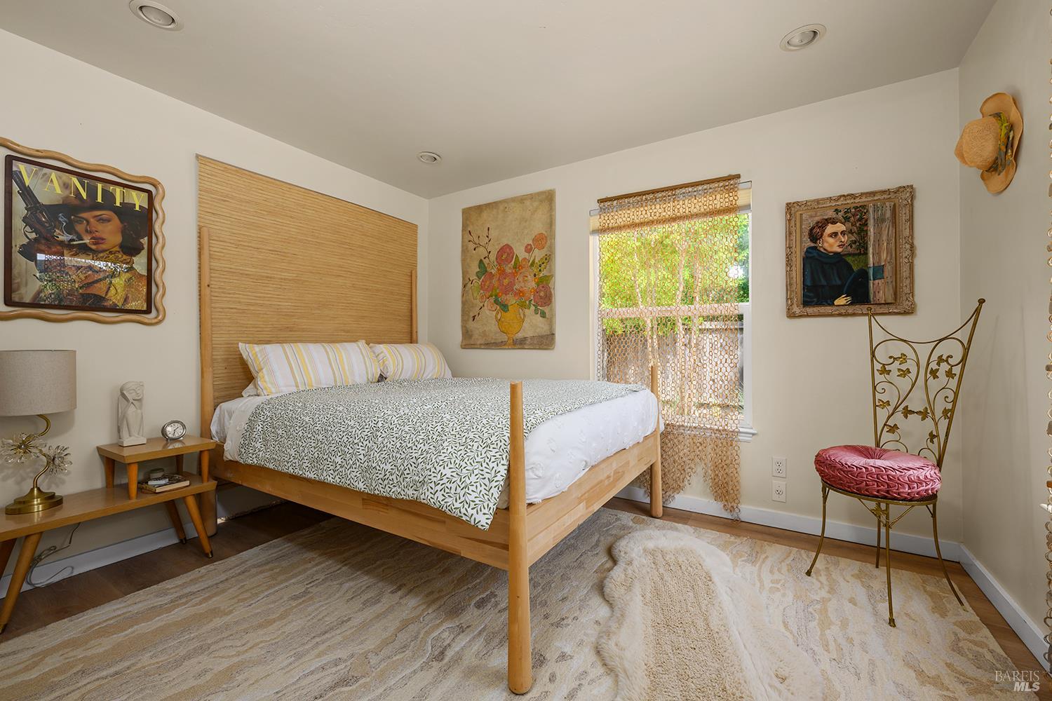 6003-6017 Red Winery Road Geyserville, CA 95441 - Photo 86 of 97 a bedroom with a bed chair and a window