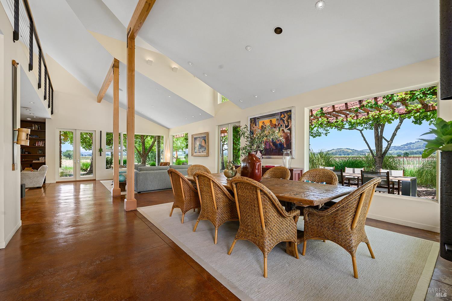 6003-6017 Red Winery Road Geyserville, CA 95441 - Photo 9 of 97 a dining room with furniture and a floor to ceiling window