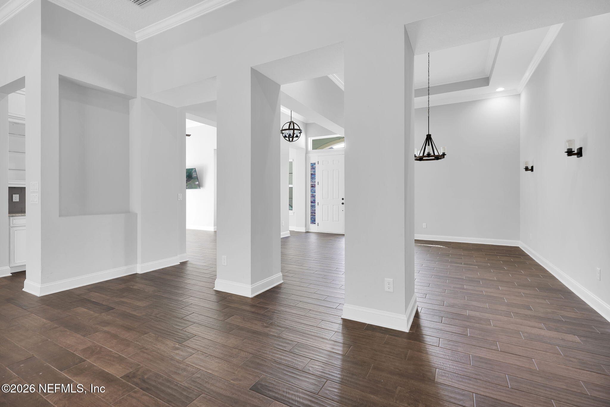 62 Broadleaf Lane St. Johns, FL 32259 - Photo 12 of 62 a view of a hallway with wooden floor