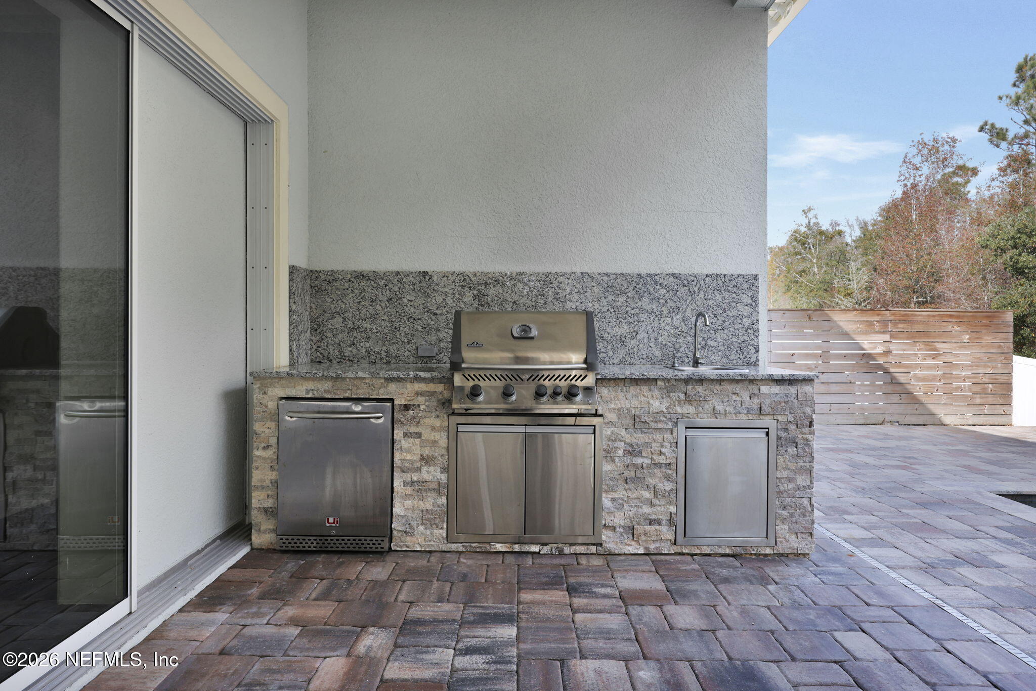 62 Broadleaf Lane St. Johns, FL 32259 - Photo 38 of 62 a view of a kitchen with granite countertop a sink and a stove