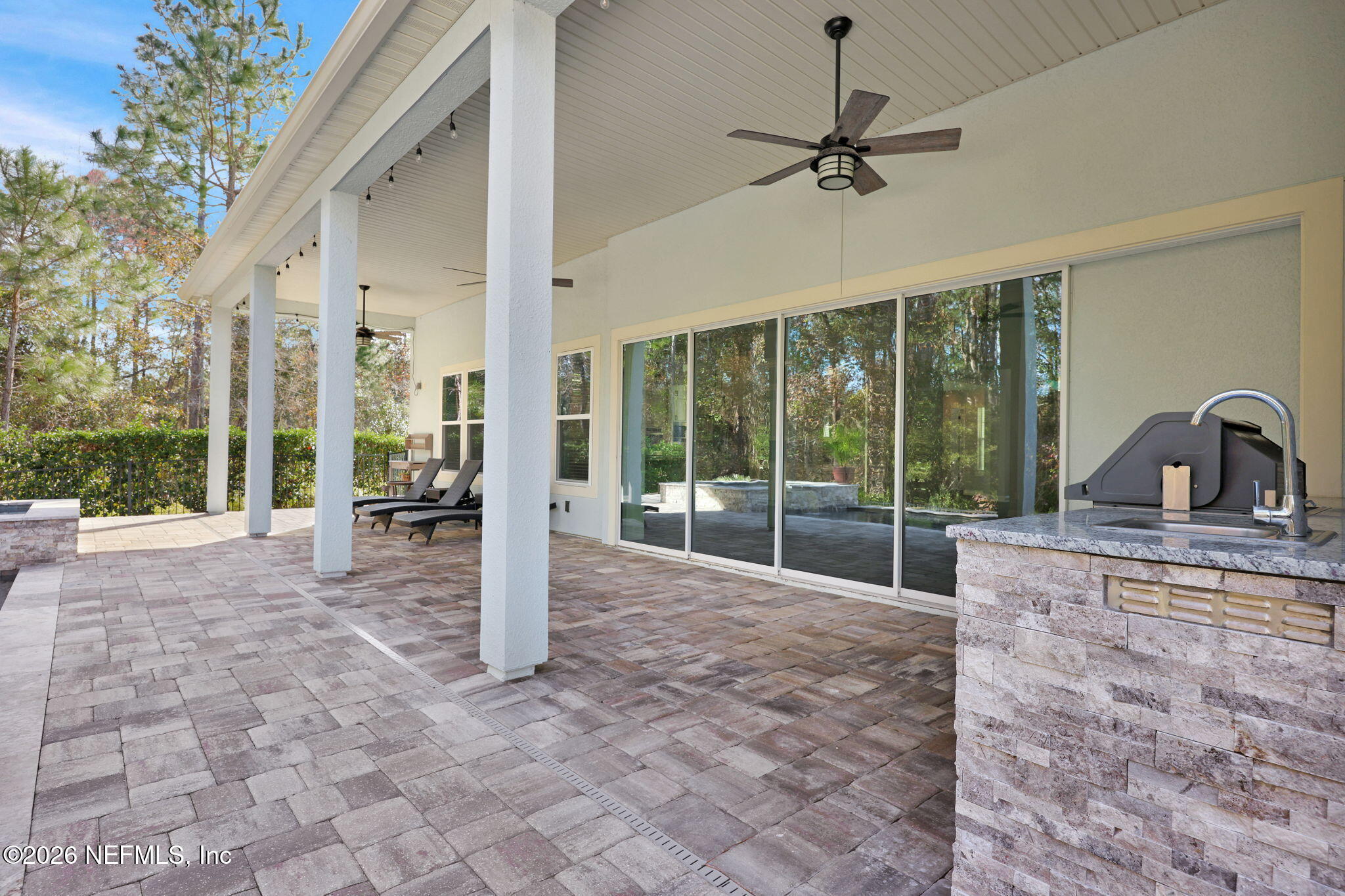 62 Broadleaf Lane St. Johns, FL 32259 - Photo 39 of 62 a view of a livingroom with a ceiling fan and balcony