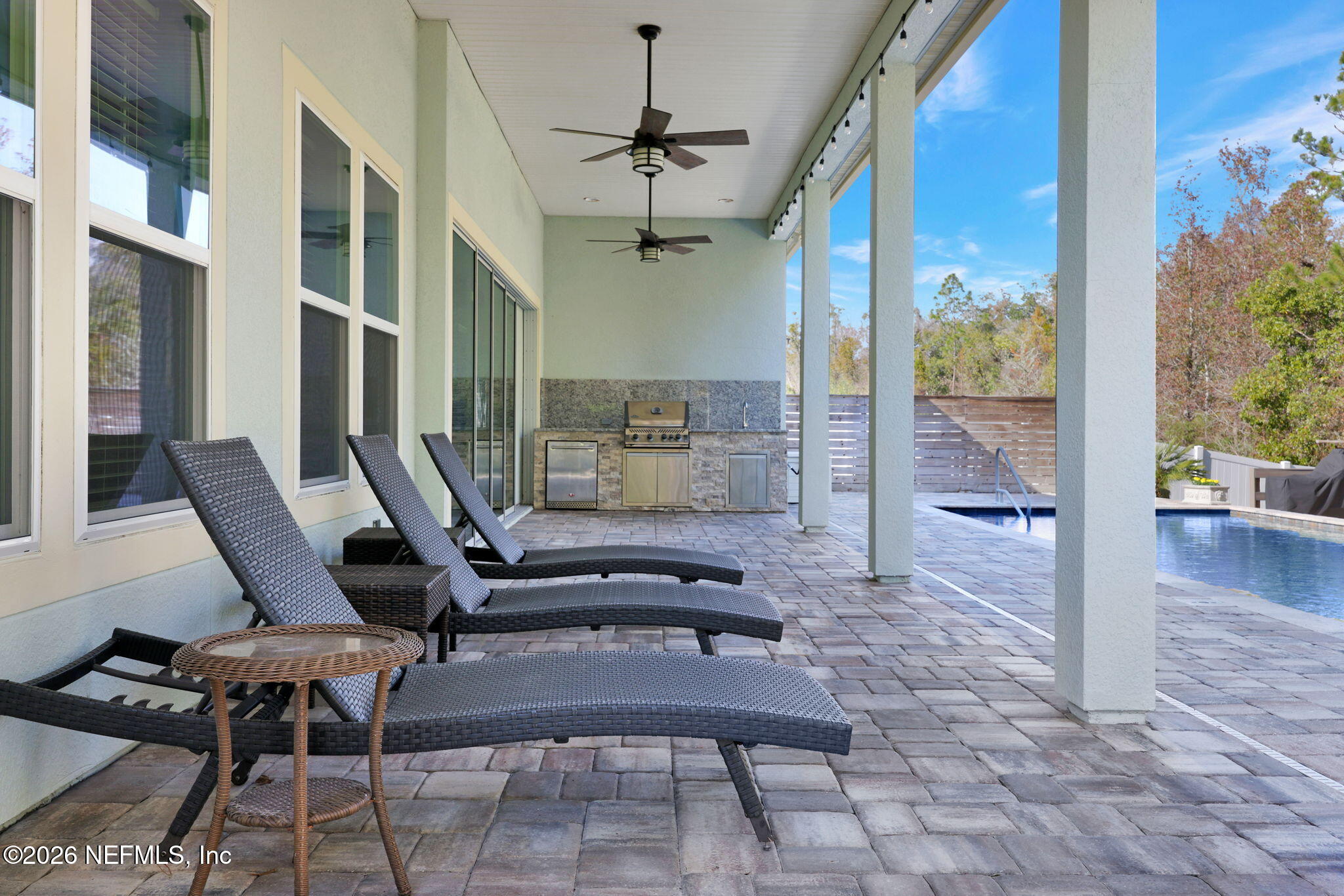 62 Broadleaf Lane St. Johns, FL 32259 - Photo 41 of 62 a view of a patio with a table and chairs
