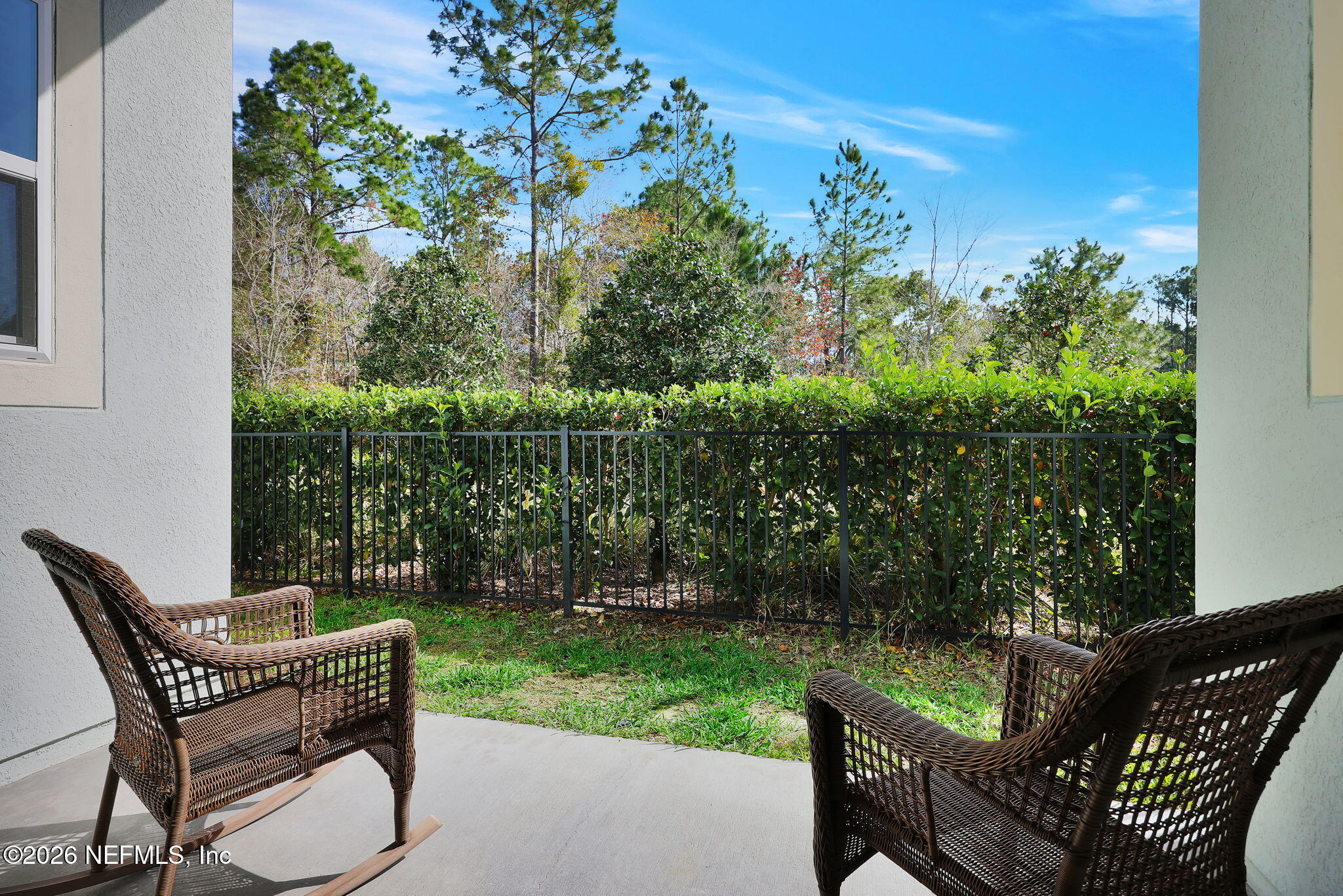 62 Broadleaf Lane St. Johns, FL 32259 - Photo 7 of 62 a view of a chair and table in backyard of the house