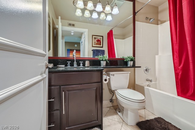 270 East Flamingo Road, Unit 315 Las Vegas, NV 89169 - Photo 9 of 11 A well-appointed bathroom offers a vanity with dark cabinetry, ample counter space, and a combination shower-tub.