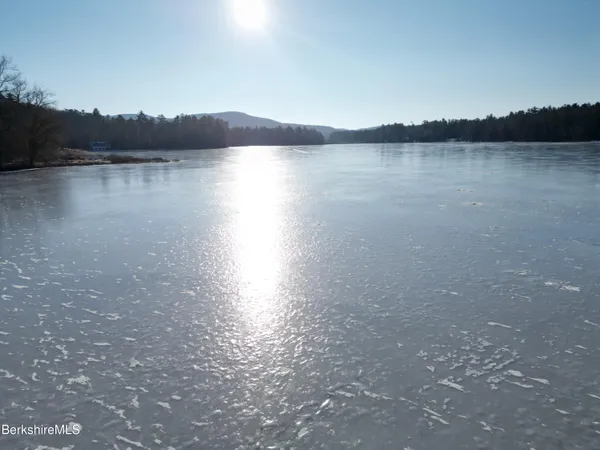 a view of lake with mountain