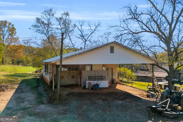a view of a yard with an outdoor space