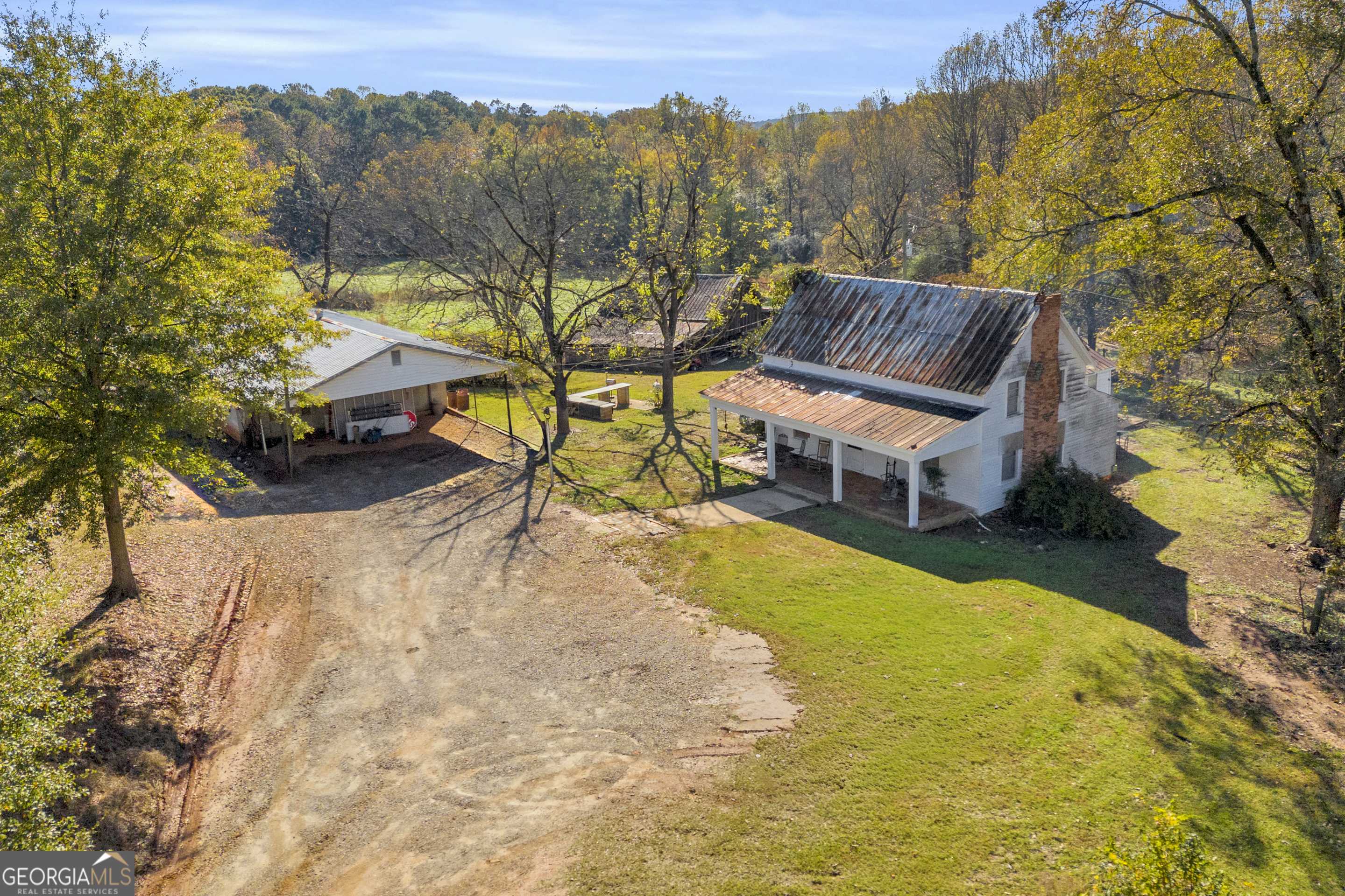 1129 Lord Road Commerce, GA 30530 - Photo 20 of 30 a view of a swimming pool with a patio and a yard