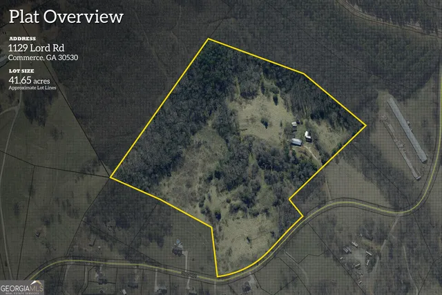 a street sign on a pole on a road