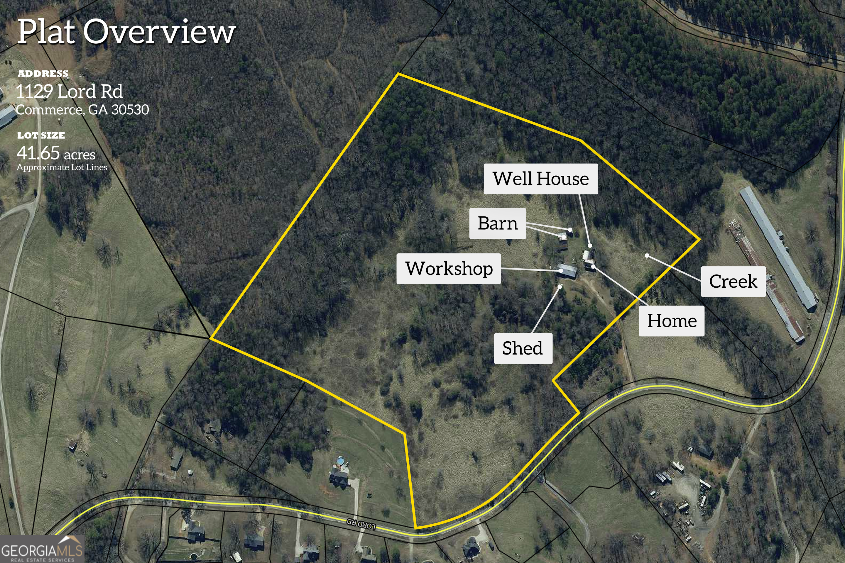 1129 Lord Road Commerce, GA 30530 - Photo 3 of 30 a street sign on a pole on a road