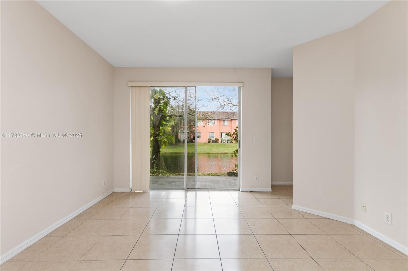 Spring Tree Sunrise, FL 33351 - Photo 14 of 44 a view of a garden from a room