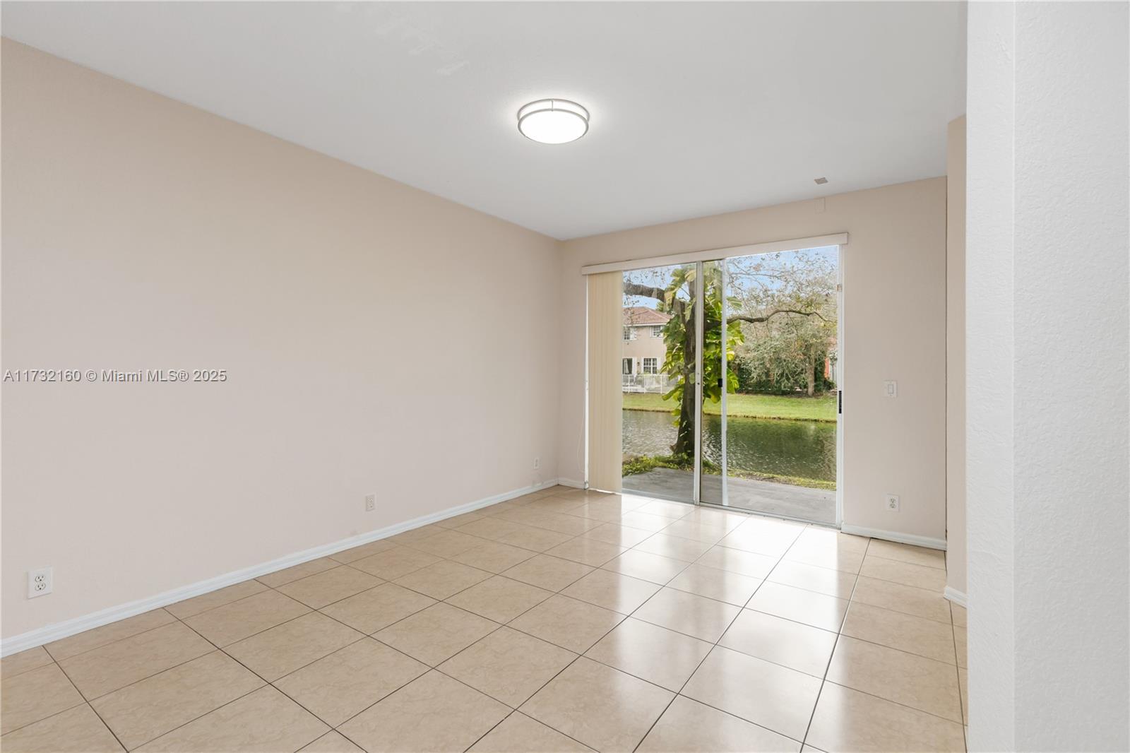 Spring Tree Sunrise, FL 33351 - Photo 20 of 44 a view of an empty room and window