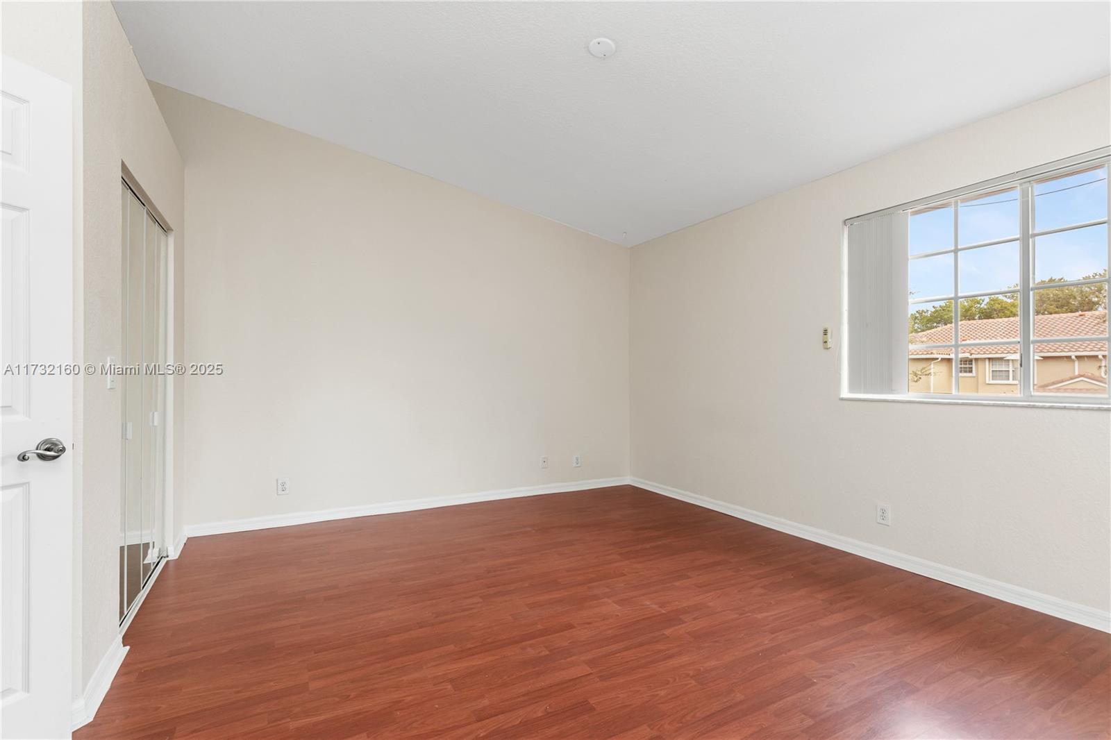 Spring Tree Sunrise, FL 33351 - Photo 24 of 44 an empty room with a window