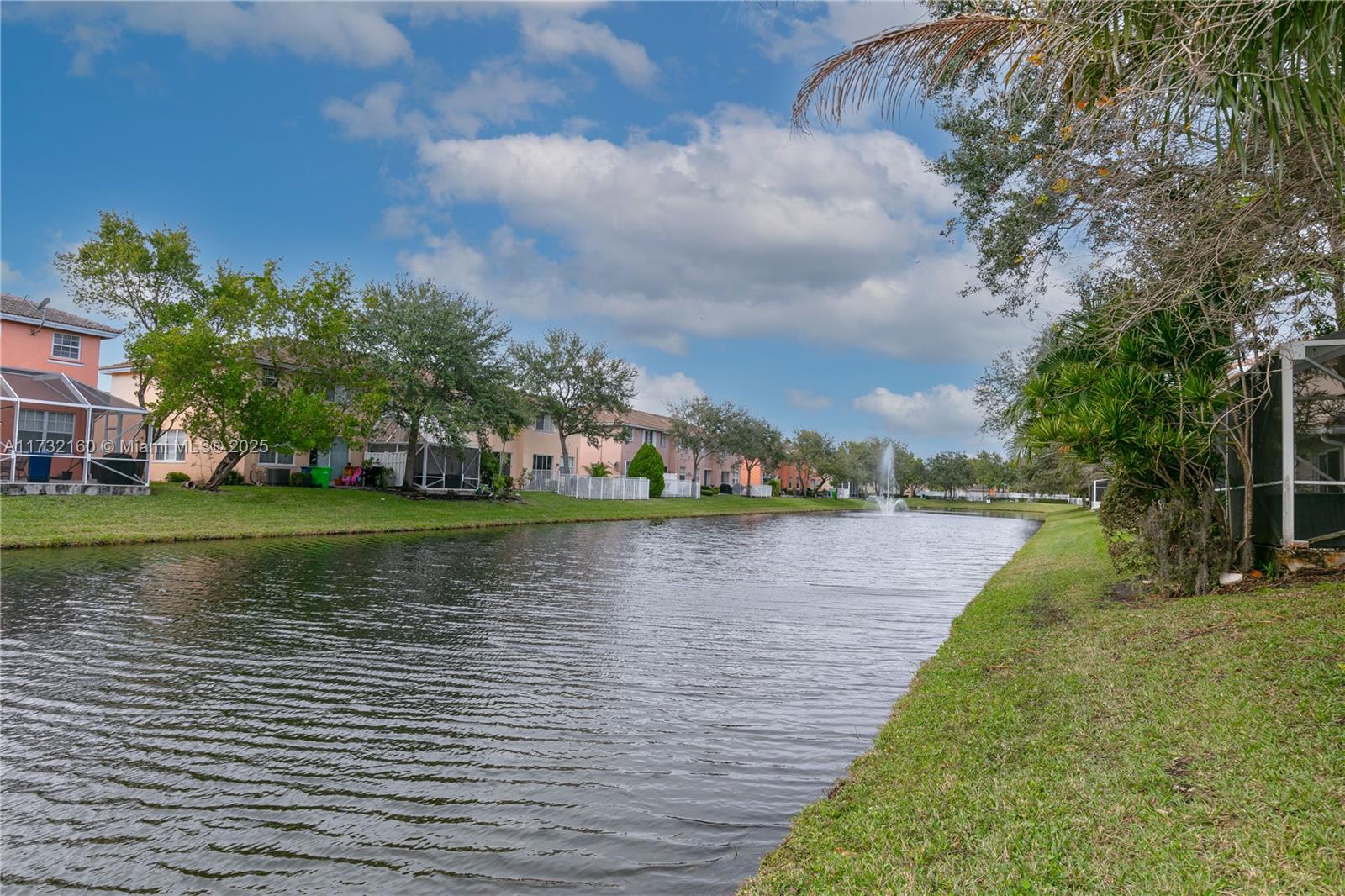 Spring Tree Sunrise, FL 33351 - Photo 36 of 44 a view of building with river in front of it