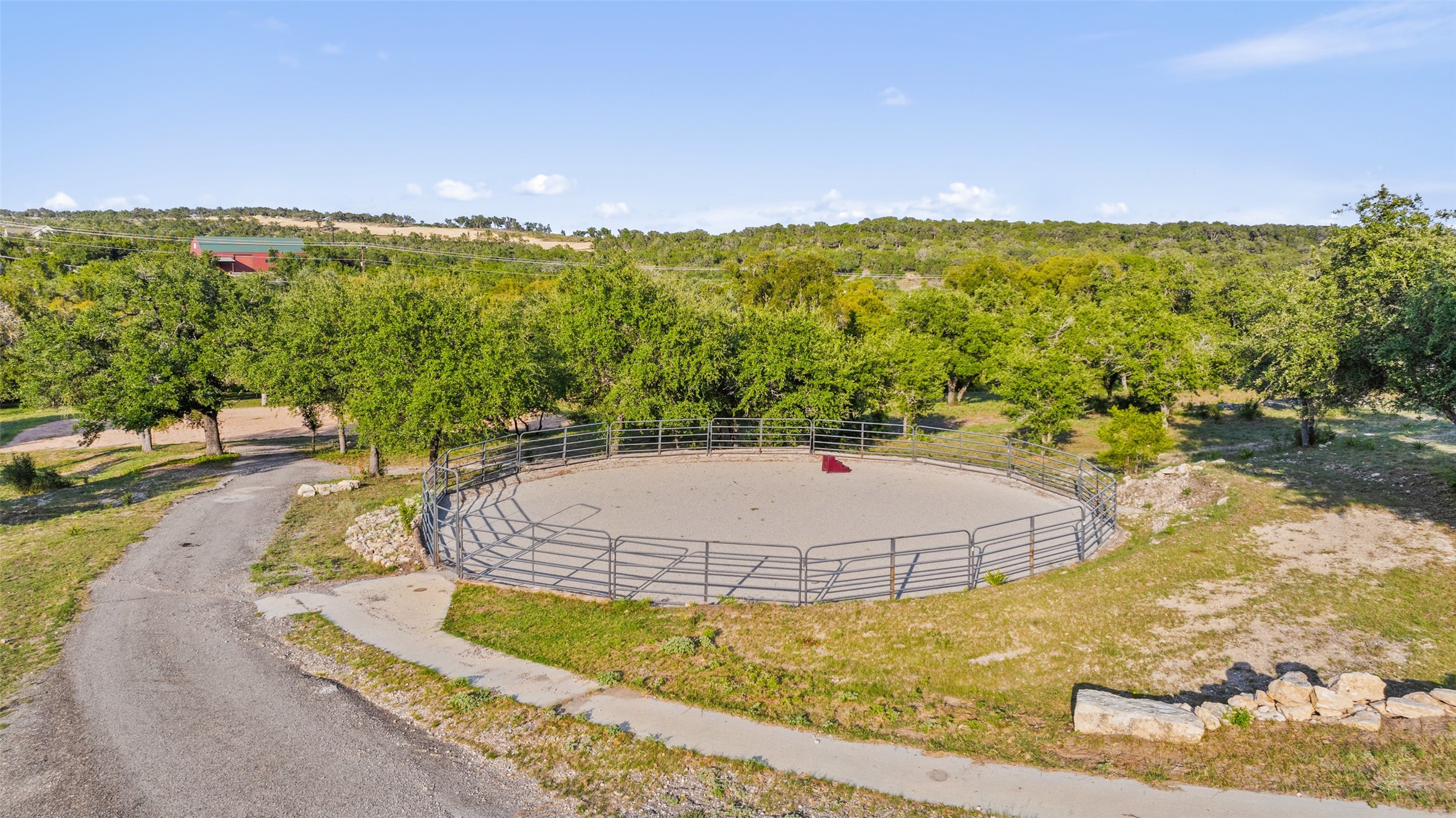 2412 Bee Creek Road Spicewood, TX 78669 - Photo 38 of 40 a view of a swimming pool with a yard and mountain view