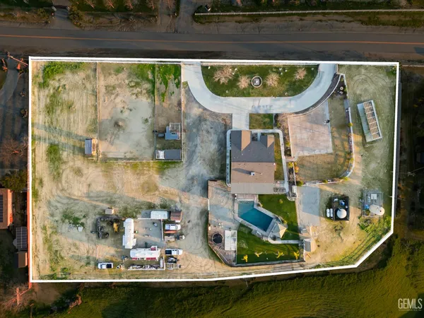 a front view of a house with swimming pool